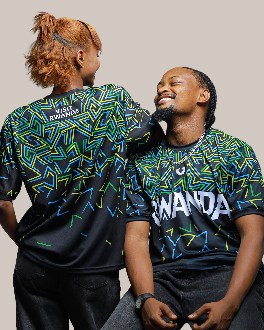 Rwandan streetwear outfit with KIZA Rwanda Inkuba black football jersey shot in Kigali