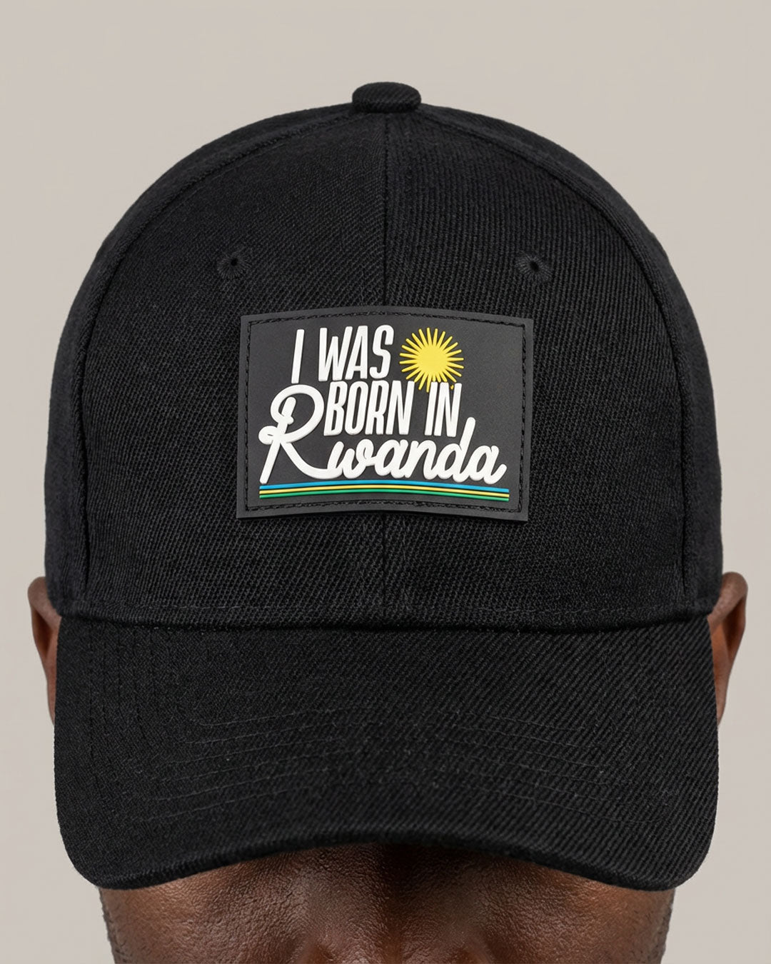 KIZA I Was Born In Rwanda black cap, travel essential for visiting Rwanda in any season