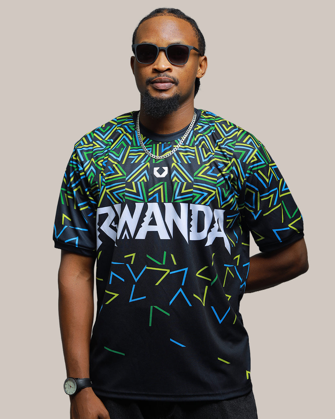 Model wearing KIZA Rwanda Inkuba black football jersey, Kigali streetwear Season 5